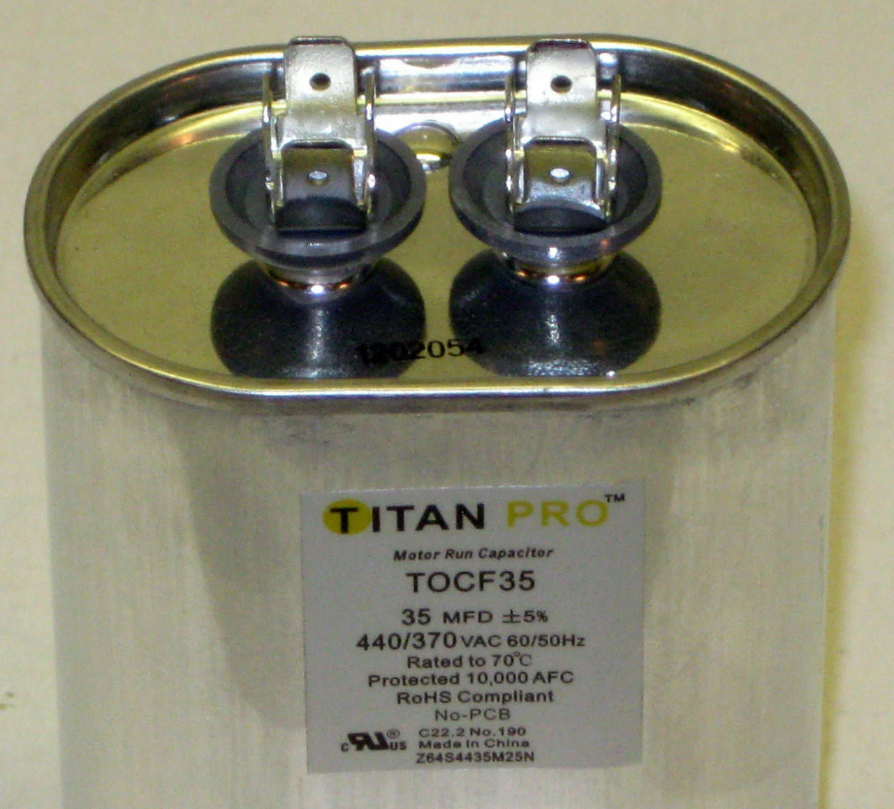TitanPro TOCF35 HVAC Motor Run Oval Capacitor. 35 MFD/UF 440/370 Volts 3 TitanPro TOCF35 HVAC Motor Run Oval Capacitor. 35 MFD/UF 440/370 Volts